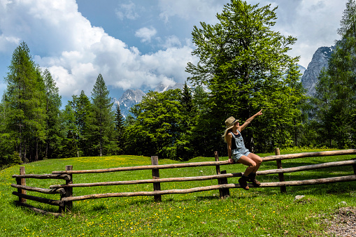 The young,Woman hiker enjoys the pass Vršič, Gorenjska, Triglav National Park, Slovenia, Julian Alps, Europe,no logos,Nikon D850