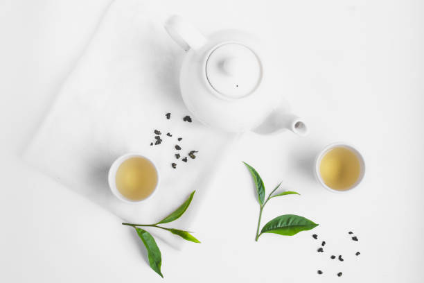 istock Green tea In white cup White background aroma 979039192