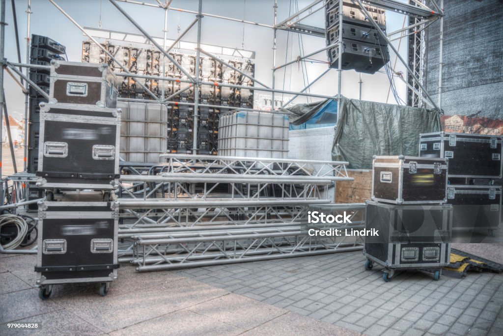 Preparing an stage for a concert Preparing an open-air stage for a concert Backstage Stock Photo