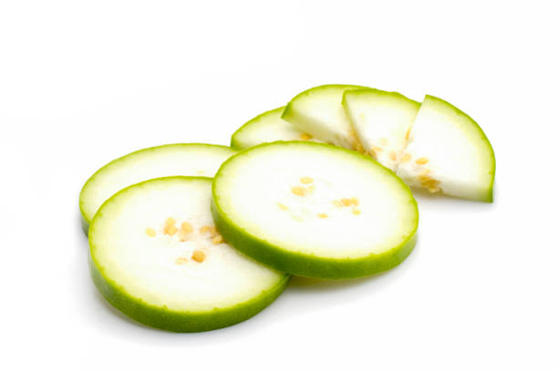 Image of slices of winter melon on white background. Vegetables. Food. stock photo