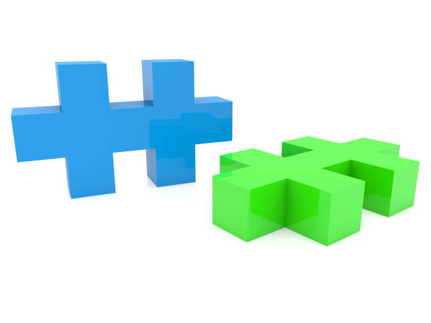 istock Two pieces of puzzle in green and blue on white 979058404