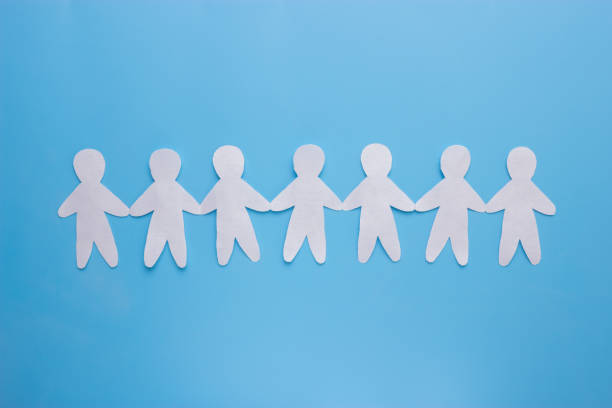 istock Paper people on the blue background 979058662