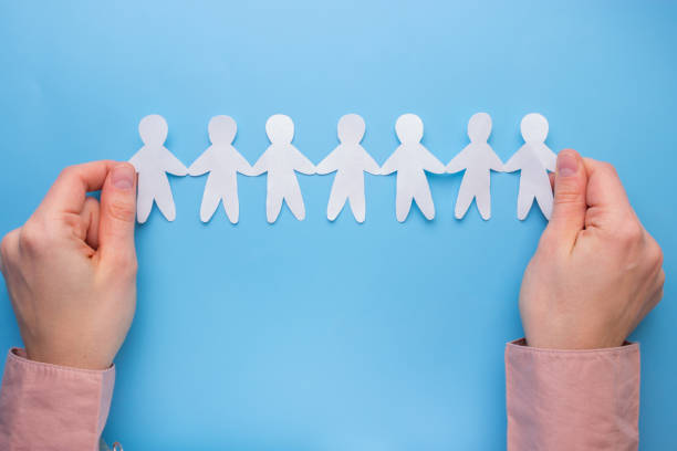 istock Paper people on the blue background 979058710