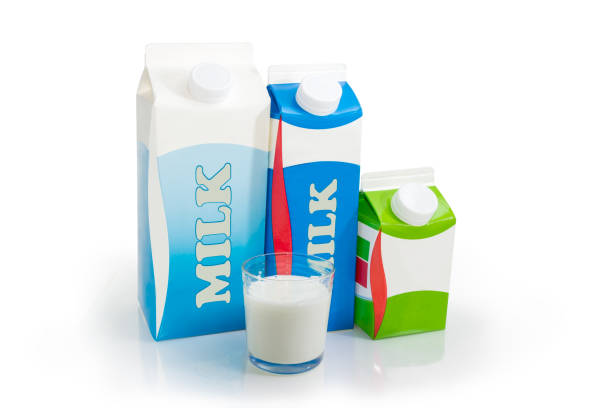 istock Milk carton different sizes and glass with various dairy produce 979064834