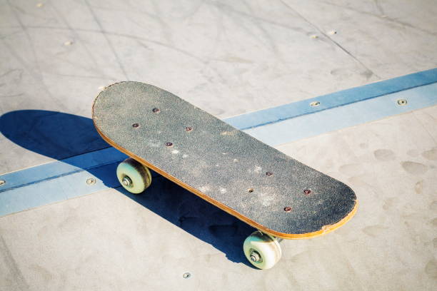 istock Old skateboard on ramp 979066950