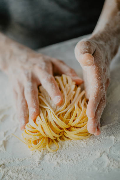 istock Chef making traditional italian homemade pasta 979074788