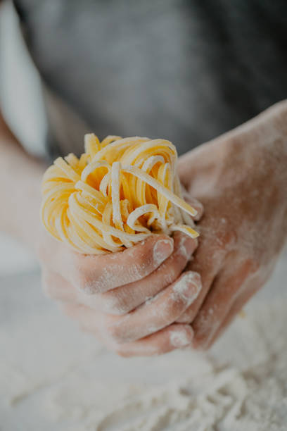 istock Chef making traditional italian homemade pasta 979074942