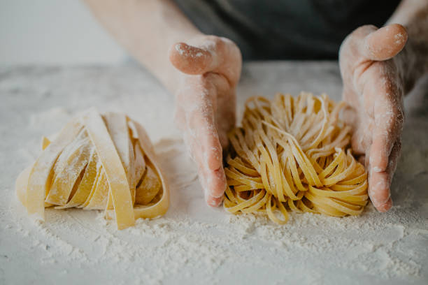 istock Chef making traditional italian homemade pasta 979074954