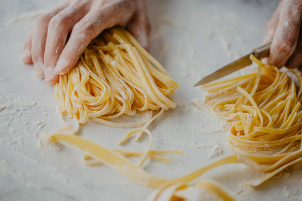 istock Chef making traditional italian homemade pasta 979074956