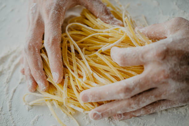 istock Chef making traditional italian homemade pasta 979074960