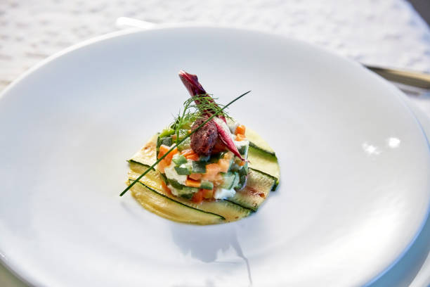 istock restaurant vegetarian appetizer tart with cheese and zucchini 979075600