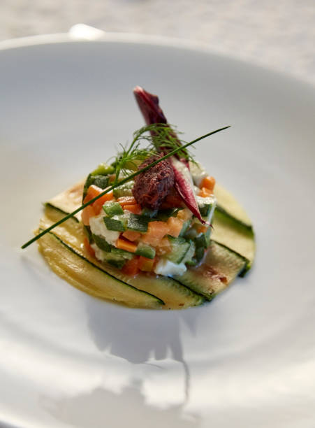 istock restaurant vegetarian appetizer tart with cheese and zucchini 979075672