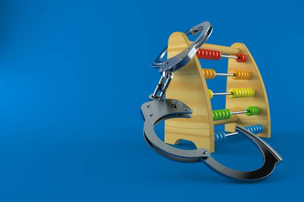 istock Wooden abacus with handcuffs 979087980