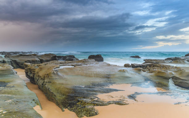istock Sunrise Seascape, Rock Platform and the Beach 979091580