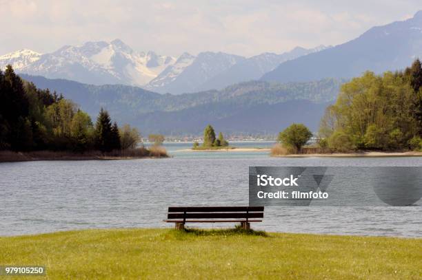 Tranquil Scene At Lake Forggensee And Mountain Range Stock Photo - Download Image Now