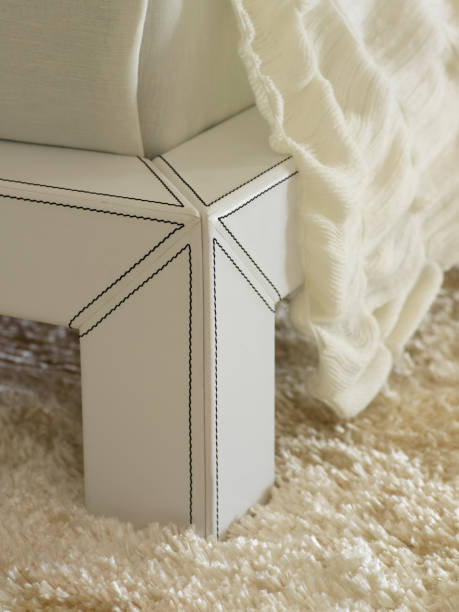 istock white bed detail on a white fur carpet 979117670