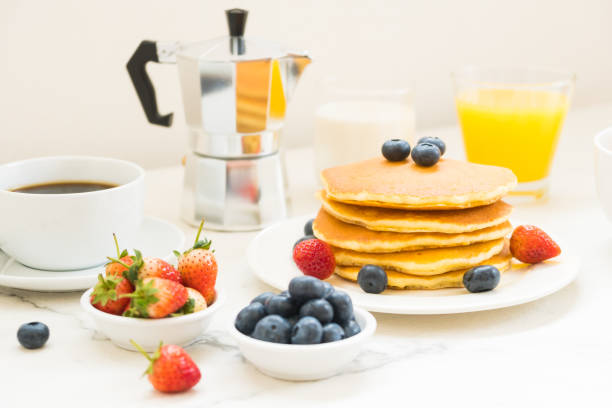 istock Close-Up Of Breakfast On Table 979120210