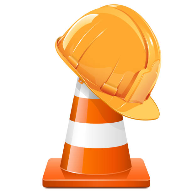 Vector Construction Cone with Helmet Vector Construction Cone with Helmet isolated on white background hard hat stock illustrations