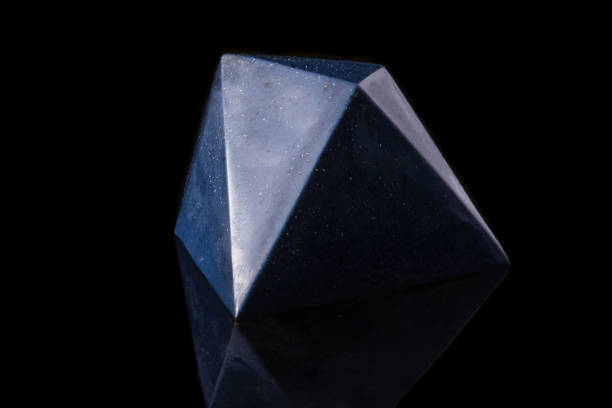 istock Dark blue luxury handmade chocolate candy on black background. Product concept for chocolatier 979132388