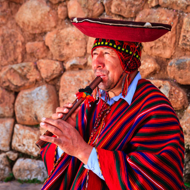istock Portrait of Peruvian man playing a flute, Sacred Valley 979132404