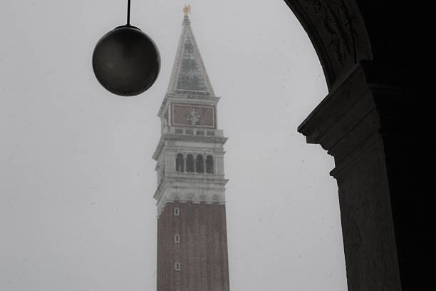 Campanile di San Marco in a snowy day stock photo