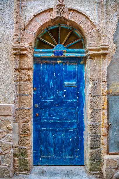 blue painted doors in the street of Essaouira, Morocco