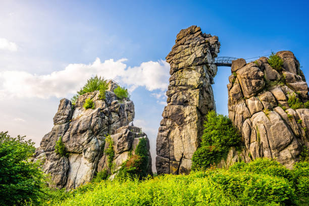 Externsteine in Teutoburg Forest, Germany Externsteine in Teutoburg Forest on a sunny summer day detmold stock pictures, royalty-free photos & images