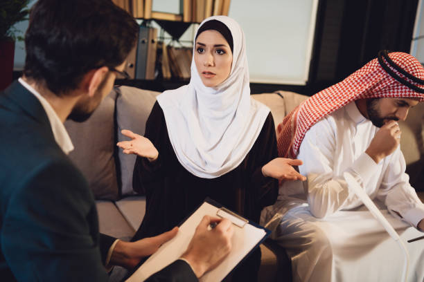 istock Arab woman at reception with psychologist. 979181866