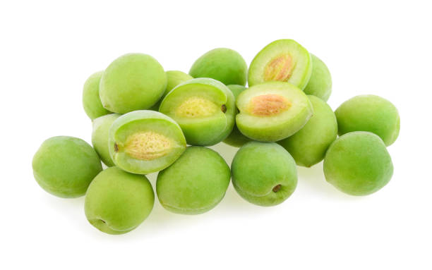 istock Green plum isolated on white background 979184996