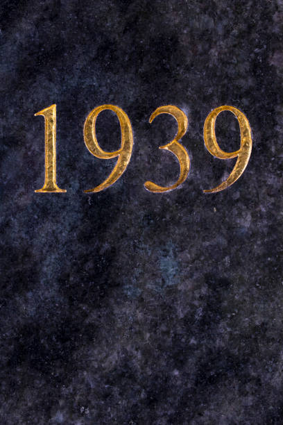 istock The number 1939, engraved in gold letters on marble. 979189024