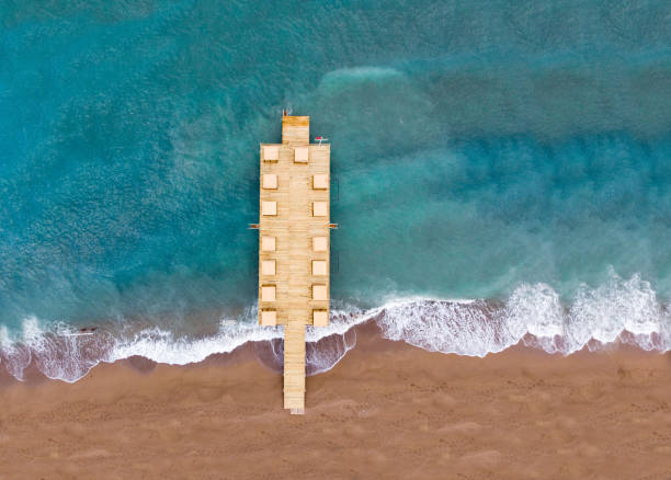 istock Pier in sea aerial photo 979189880