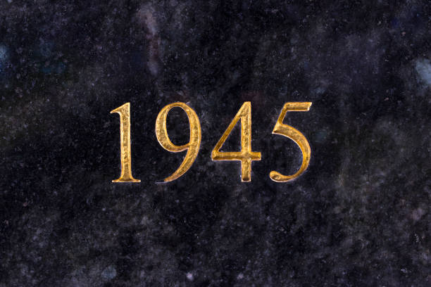 istock The number 1945, engraved in gold letters on marble. 979190558