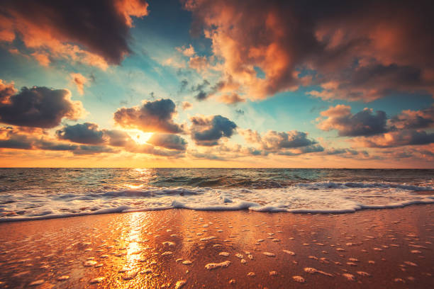 istock Beautiful cloudscape over the sea, sunrise shot 979193428