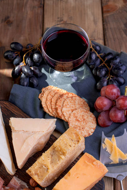 istock A glass of red wine and a snack. copy space 979196024