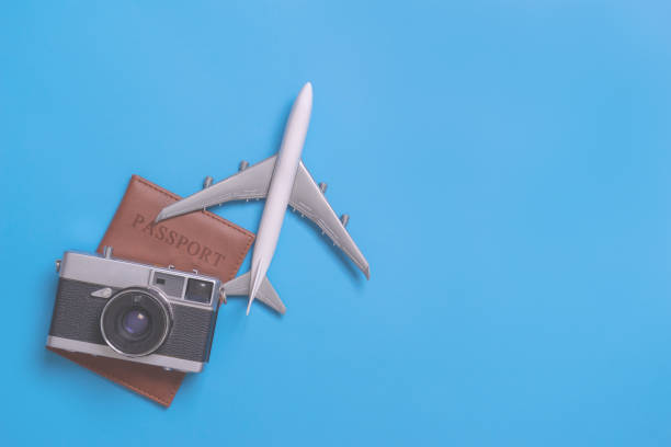 istock retro Travel objects for world travel concept on blue background 979199328