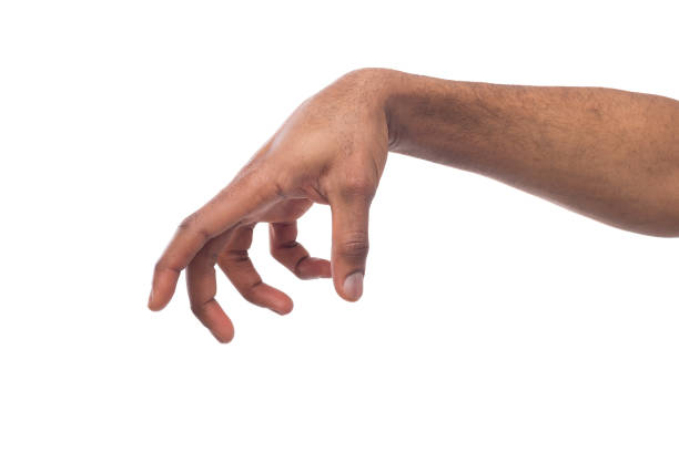 istock Male hand picking up something, cutout 979200658