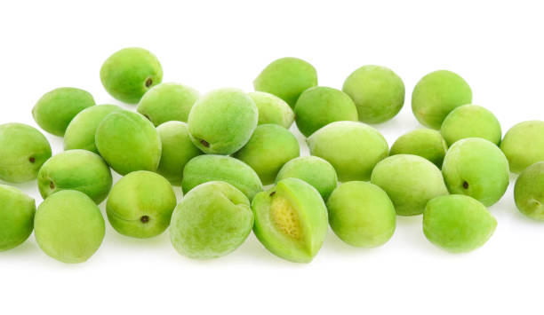 istock Green plum isolated on white background 979201506