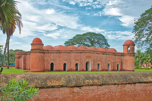 lateral view on the sixty-dome mosque in Bagerhat, Bangladesh