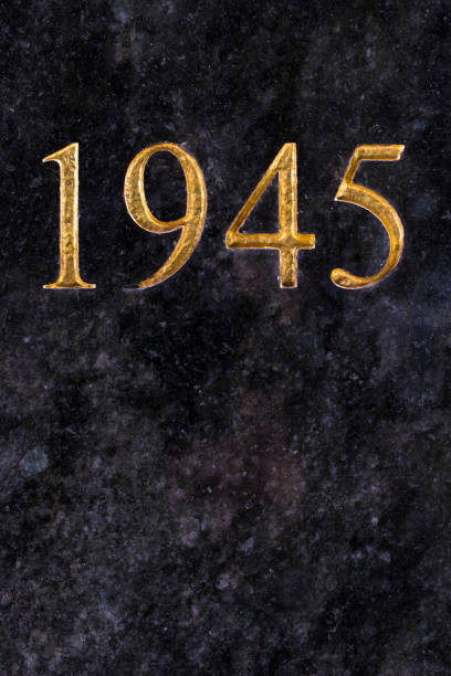 istock The number 1945, engraved in gold letters on marble. 979204320