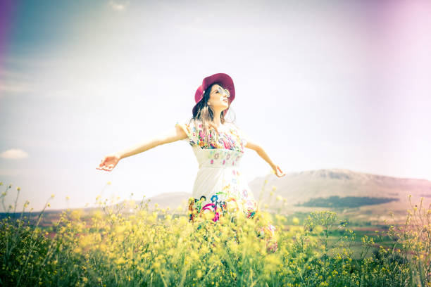 istock a young woman in the spring 979205040