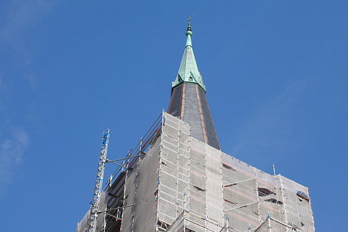 Construction site, scaffolded and covered with tarpaulins Herz-Jesu-Kirche, Bremerhaven, Germany, Europe