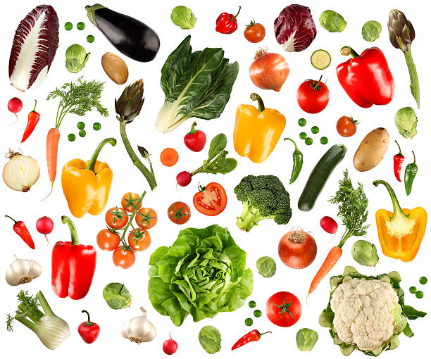 Arrangement of several vegetables against white background