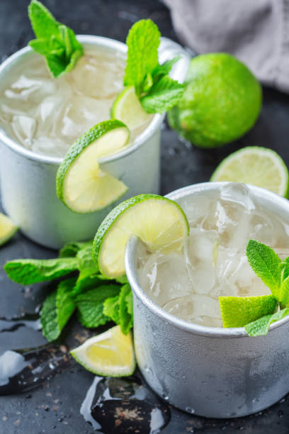 istock Moscow mule cocktail with vodka, ginger beer, lime and mint 979212380