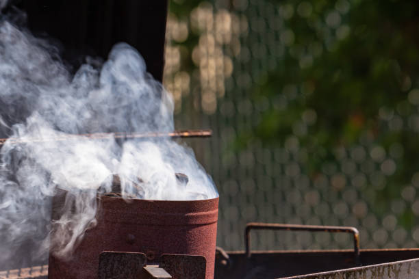 istock Starting BBQ charcoal  in chimney 979212624