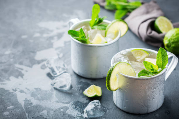 istock Moscow mule cocktail with vodka, ginger beer, lime and mint 979213118
