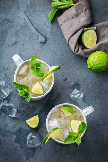 istock Moscow mule cocktail with vodka, ginger beer, lime and mint 979213256