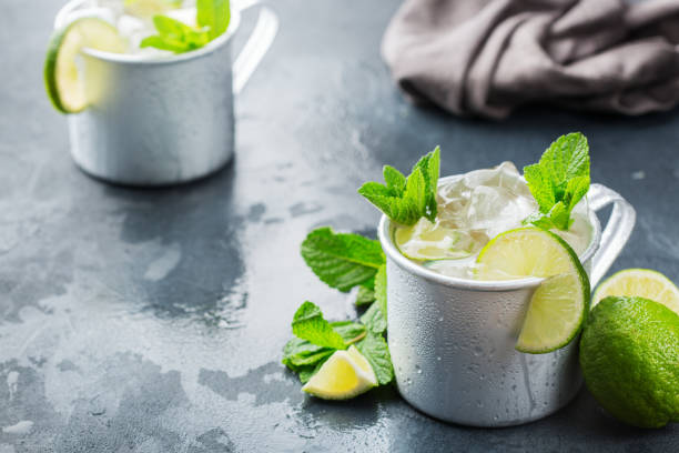 istock Moscow mule cocktail with vodka, ginger beer, lime and mint 979213756