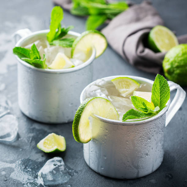 istock Moscow mule cocktail with vodka, ginger beer, lime and mint 979213808