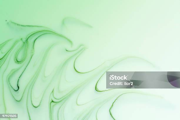 Mix Of A White And Green Paint Stock Photo - Download Image Now - Abstract, Backgrounds, Blob