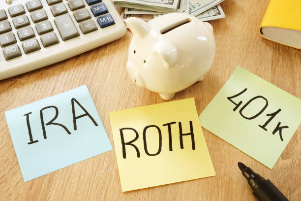 istock Memo sticks with words IRA 401k ROTH. Retirement plans. 979216632